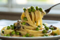 Pasta cremosa piselli e funghi