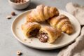 Cornetti veloci alla Nutella di pasta sfoglia: pronti in 10 minuti e con il cuore sempre morbido!