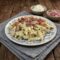 Pasta cremosa con ricotta zafferano e pancetta croccante