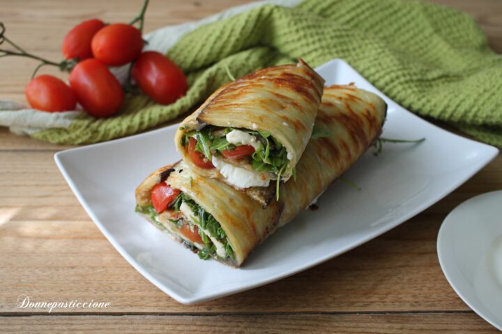 rotolo di melanzane ripieno di rucola e mozzarella