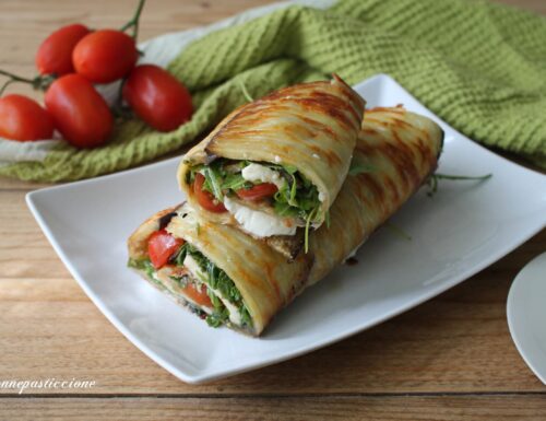 Rotolo di melanzane ripieno di rucola e mozzarella