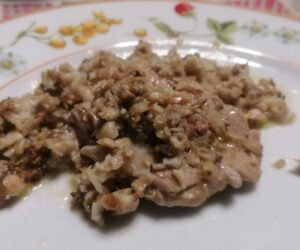 Medaglioni di arista di maiale con funghi pioppini