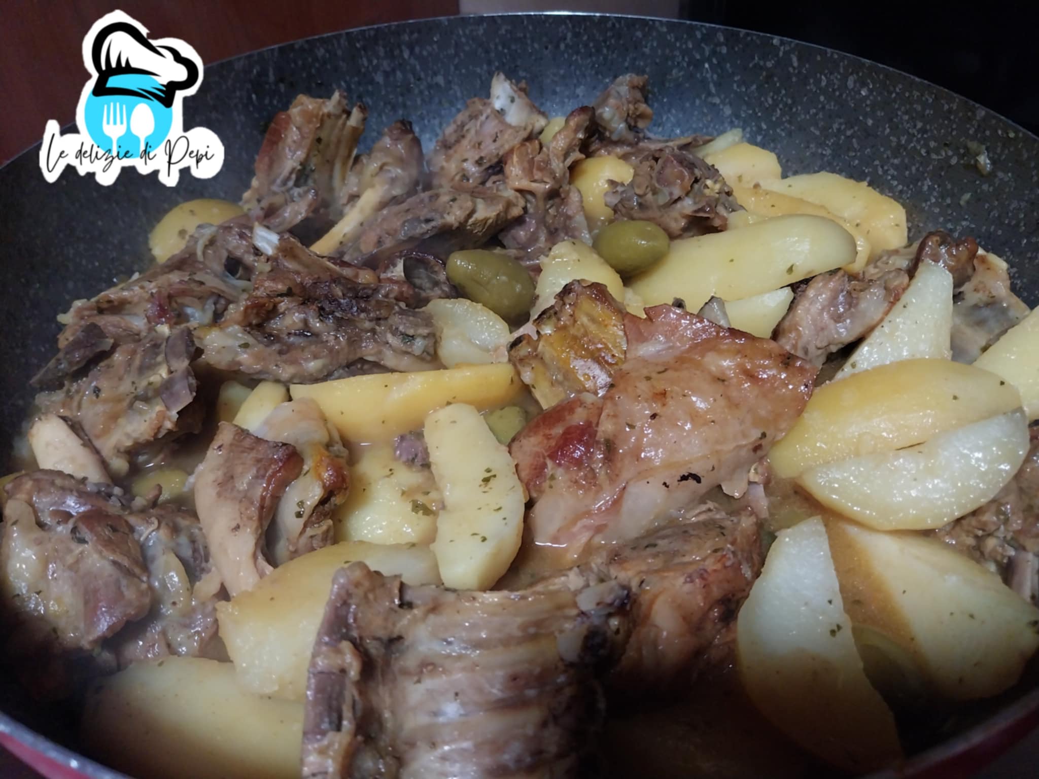 agnello speziato con patate e olive