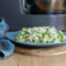 Risotto con piselli e cipollotti