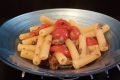 Pasta con funghi salsiccia e pomodorini