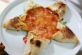 Pizza stella con base di pizza margherita