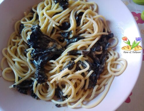 Spaghetti con burrata e funghi trombette dei morti