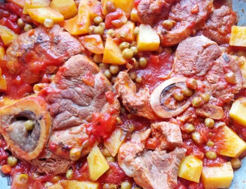 Ossibuchi al sugo con piselli