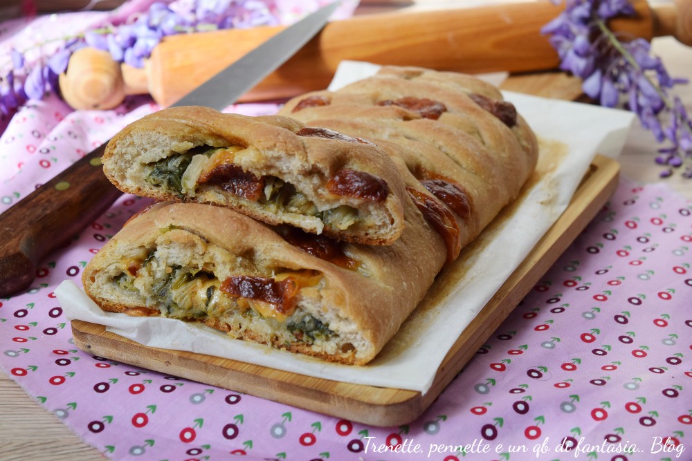 Pane intrecciato con scarola e formaggio perfetto per le feste e aperitivi, una variante appetitosa della classica pizza di scarola.